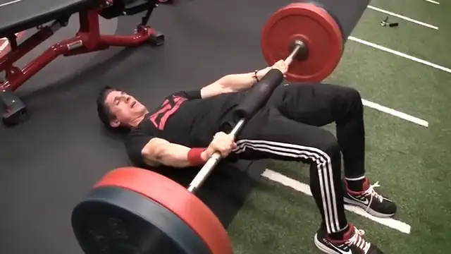 barbell hip thrusts on the floor