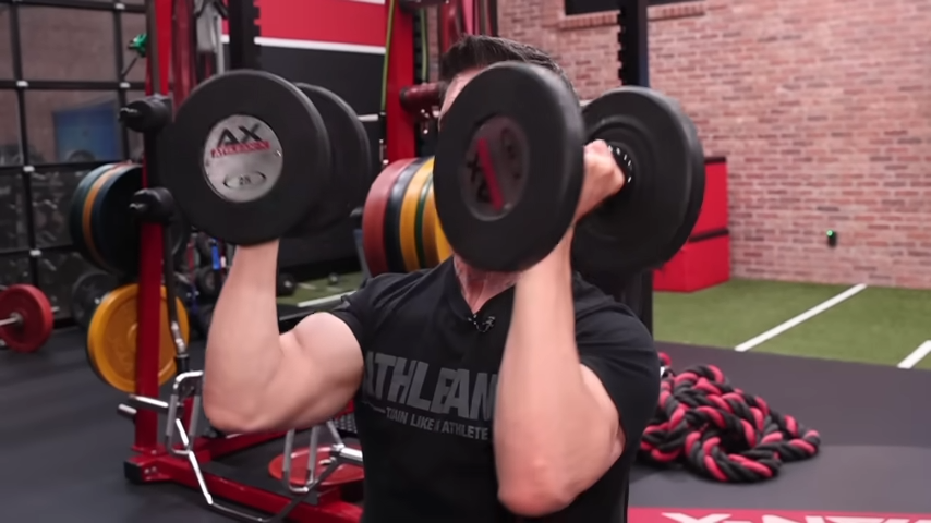 lowering the dumbbells arnold press